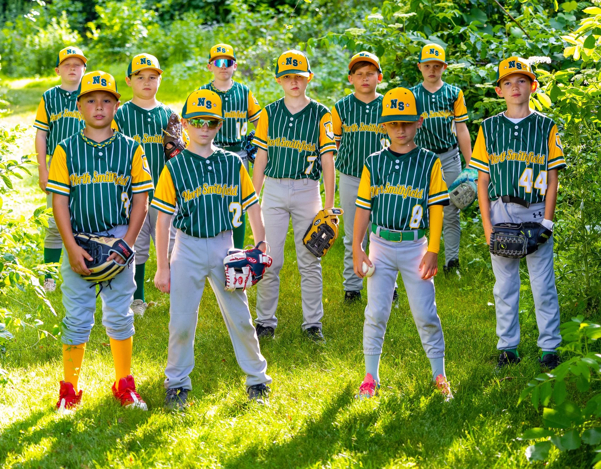 Youth baseball team group photo on the field